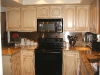 Cream Colored refinished cabinets
