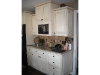 Deco white with american cherry glaze cabinets