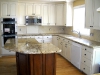White Cupboards with Brown Island
