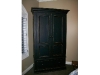 Black distressed armoire