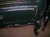 Detail of black distressed dresser