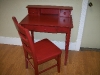 Red chair and secretary desk